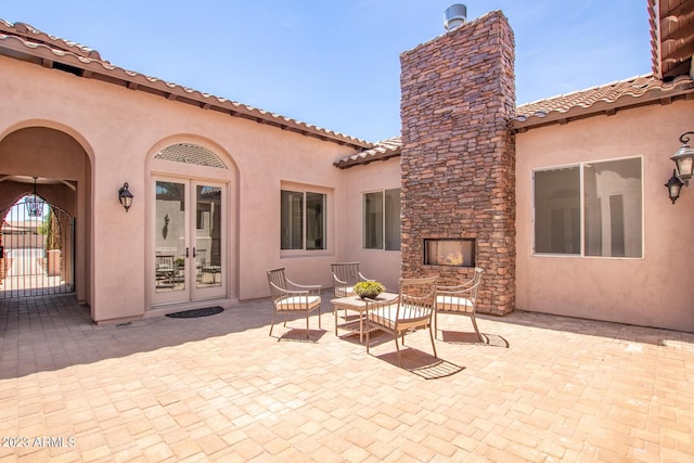 view of patio featuring french doors