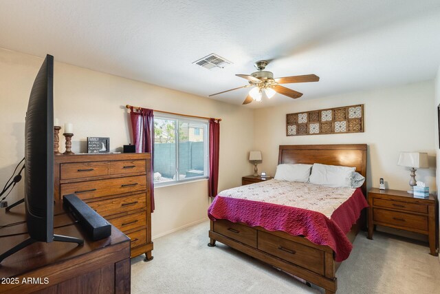 12318 W Bloomfield Rd, El Mirage, AZ 85335 - bedroom featuring light carpet, ceiling fan, and baseboards