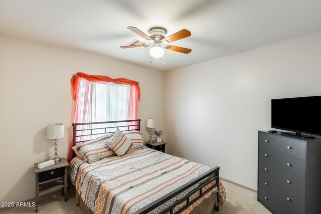 12318 W Bloomfield Rd, El Mirage, AZ 85335 - bedroom with light colored carpet and a ceiling fan