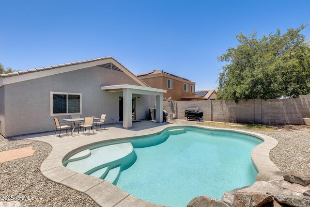 12318 W Bloomfield Rd, El Mirage, AZ 85335 - view of swimming pool featuring a fenced backyard and a patio