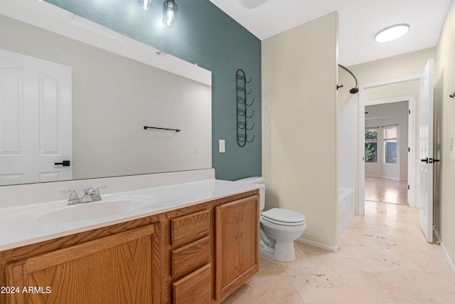 full bathroom with toilet,  shower combination, and vanity