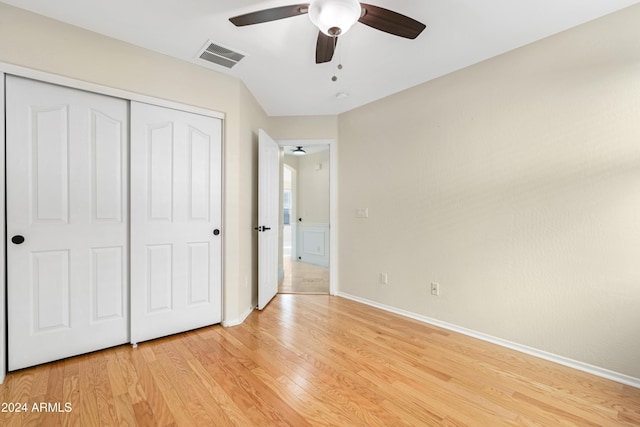 unfurnished bedroom featuring a closet, ceiling fan, and light hardwood / wood-style floors