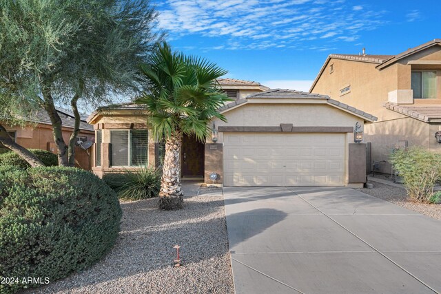 view of front of home with a garage