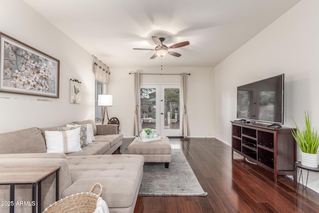 living area with dark wood-style floors, ceiling fan, and french doors