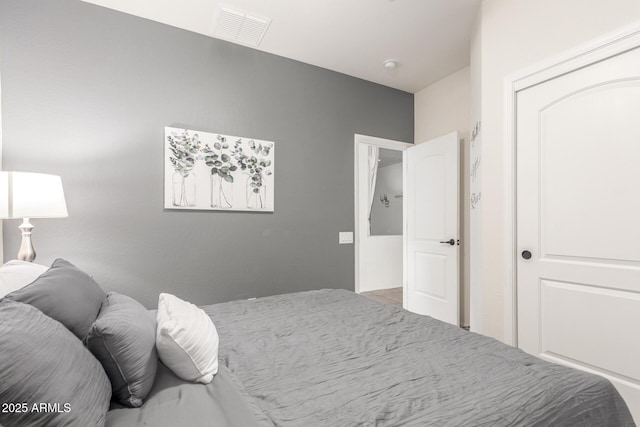 bedroom with visible vents