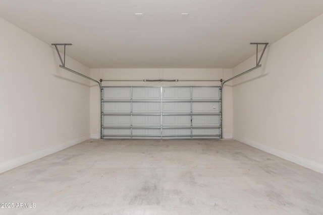 garage featuring baseboards