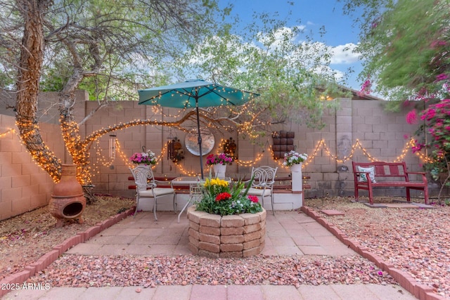 view of patio with fence