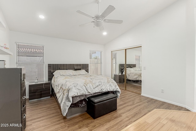 20424 N 96th Ln, Peoria, AZ 85382 - bedroom with vaulted ceiling, a closet, light wood-style floors, baseboards, and recessed lighting