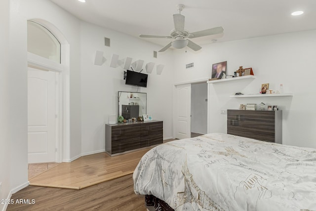 20424 N 96th Ln, Peoria, AZ 85382 - bedroom with wood finished floors, recessed lighting, a high ceiling, baseboards, and a ceiling fan