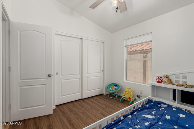 20424 N 96th Ln, Peoria, AZ 85382 - bedroom with lofted ceiling, wood finished floors, a closet, a ceiling fan, and baseboards