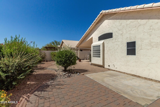 20424 N 96th Ln, Peoria, AZ 85382 - fenced backyard featuring a patio area