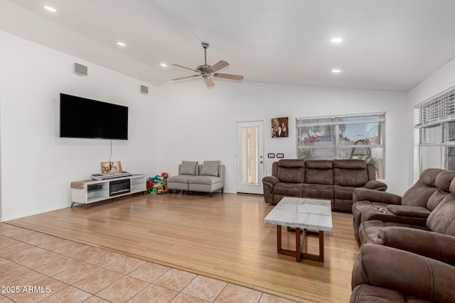 20424 N 96th Ln, Peoria, AZ 85382 - living area featuring vaulted ceiling, ceiling fan, light wood finished floors, and recessed lighting
