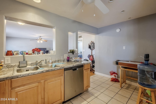 kitchen featuring light brown cabinetry, stainless steel dishwasher, ceiling fan, sink, and light tile patterned floors