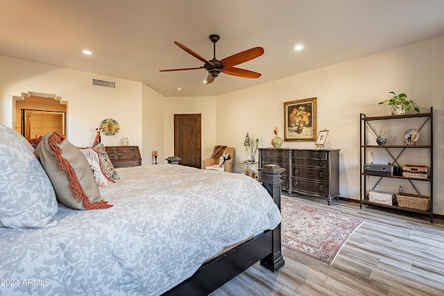 bedroom with visible vents, wood finished floors, recessed lighting, baseboards, and ceiling fan