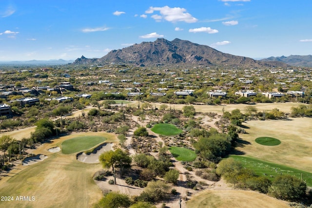 birds eye view of property featuring view of golf course and a mountain view