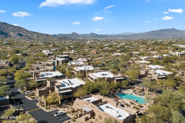 birds eye view of property featuring a mountain view