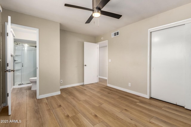 915 E Commonwealth Pl, Chandler, AZ 85225 - unfurnished bedroom with light wood-style floors, a closet, ensuite bathroom, and a ceiling fan