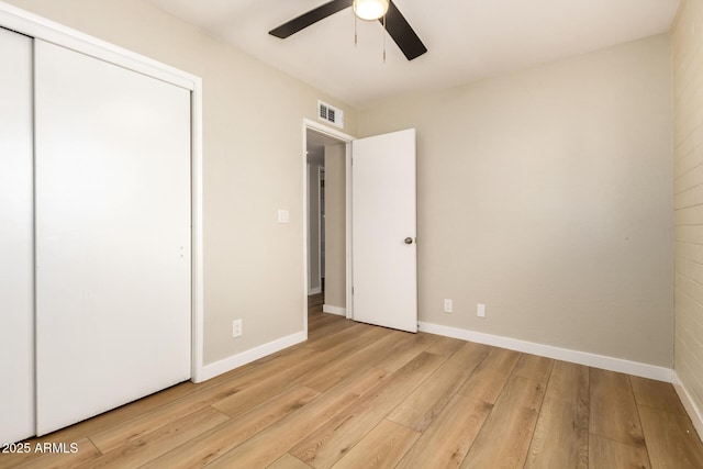 915 E Commonwealth Pl, Chandler, AZ 85225 - unfurnished bedroom with light wood-type flooring, a closet, and a ceiling fan