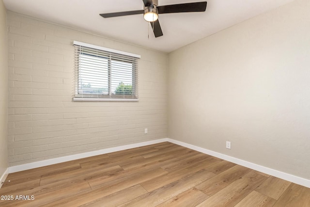 915 E Commonwealth Pl, Chandler, AZ 85225 - unfurnished room with wood finished floors and a ceiling fan