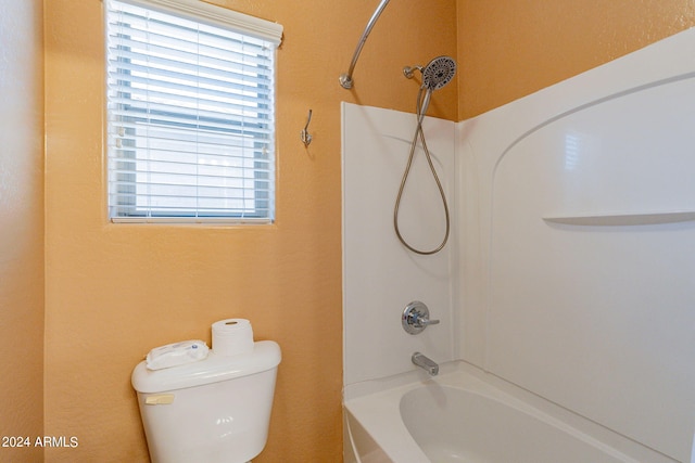 bathroom with toilet and shower / bathtub combination