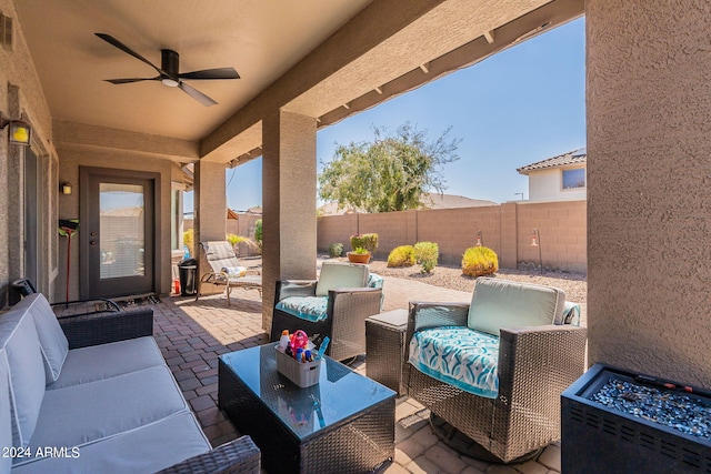 view of patio / terrace featuring an outdoor living space and ceiling fan