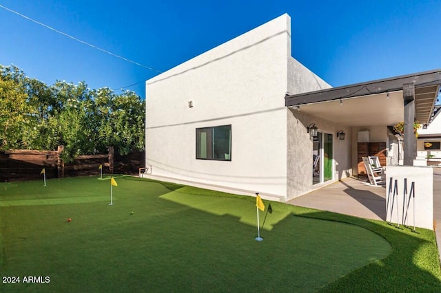 view of property exterior featuring a patio