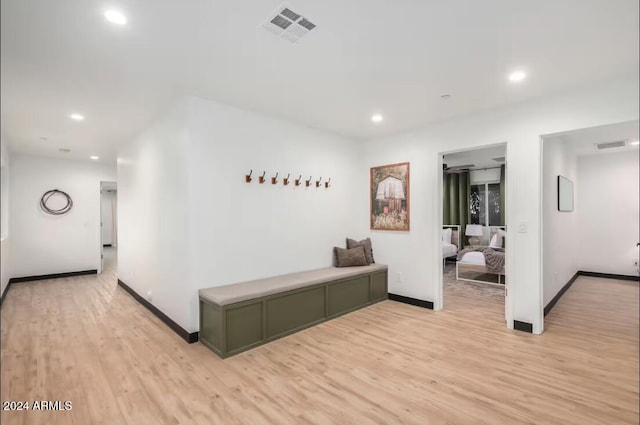 hallway featuring light wood-type flooring