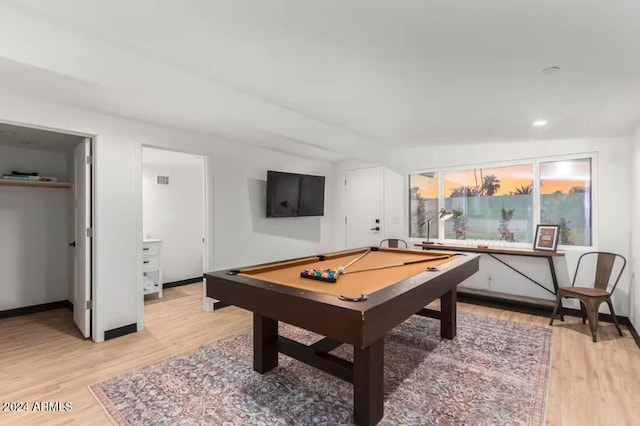 recreation room featuring pool table, vaulted ceiling, and light hardwood / wood-style floors