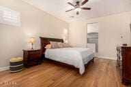 bedroom featuring hardwood / wood-style floors and ceiling fan