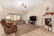 living room with ceiling fan