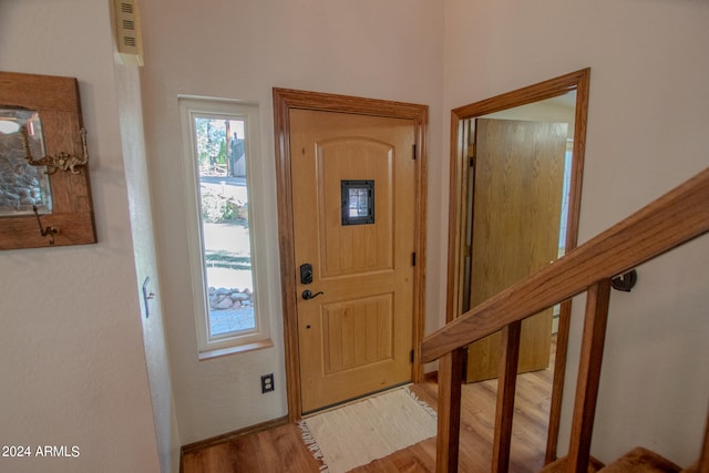 entrance foyer with hardwood / wood-style flooring