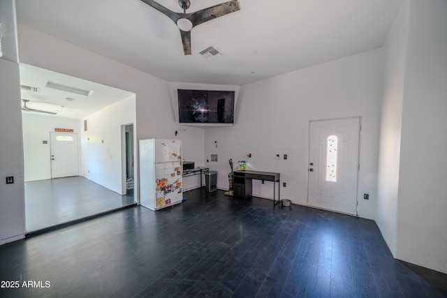 interior space with visible vents and wood finished floors
