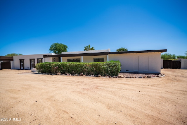 view of front of home featuring stucco siding