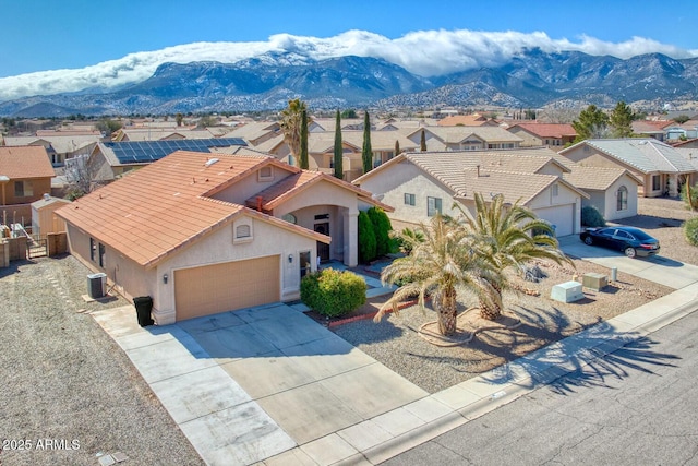 drone / aerial view featuring a mountain view