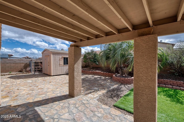 view of patio / terrace with a storage unit