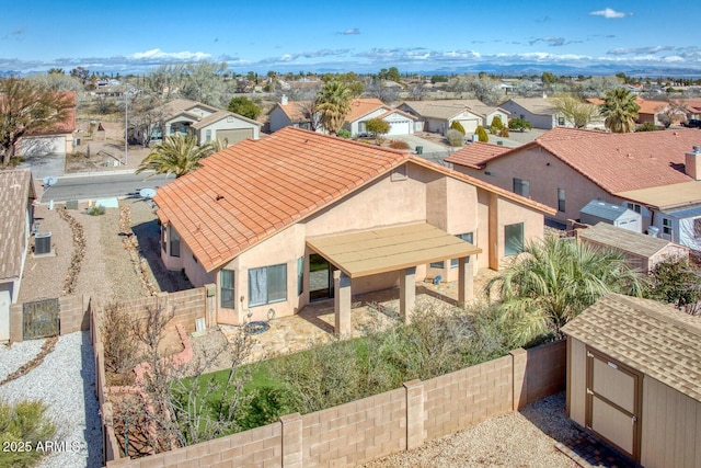 birds eye view of property with a mountain view