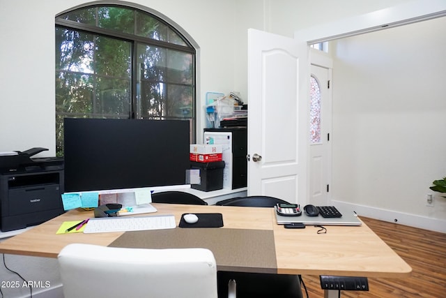 office area with hardwood / wood-style floors