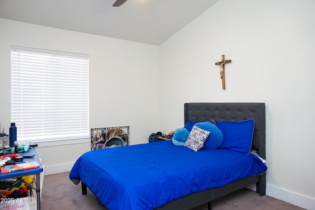 bedroom featuring ceiling fan, light carpet, and lofted ceiling