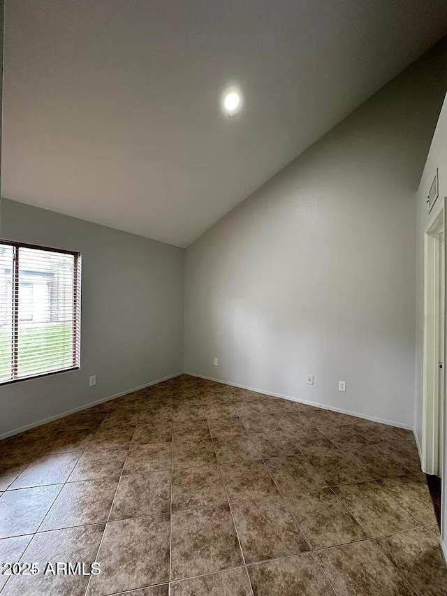 14002 N 49th Ave Unit 1120, Glendale, AZ 85306 - spare room with vaulted ceiling, baseboards, recessed lighting, and tile patterned flooring