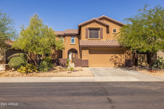 2528 W Coyote Creek Dr, Phoenix, AZ 85086 - mediterranean / spanish house featuring a garage