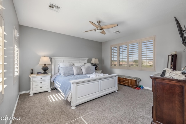 carpeted bedroom featuring ceiling fan