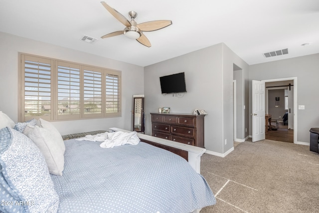 carpeted bedroom featuring ceiling fan