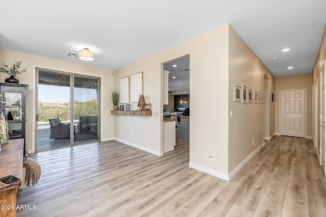 interior space with light hardwood / wood-style flooring