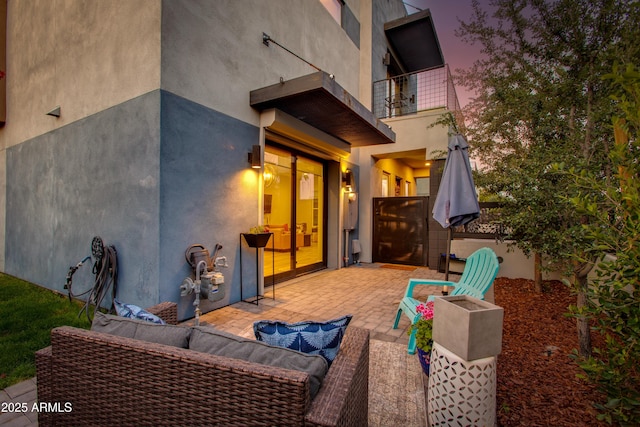 view of patio / terrace featuring outdoor lounge area and a balcony