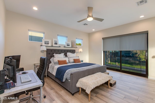 bedroom featuring visible vents, a ceiling fan, access to outside, and light wood-type flooring