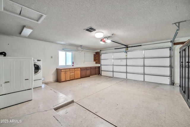 garage featuring washer / dryer