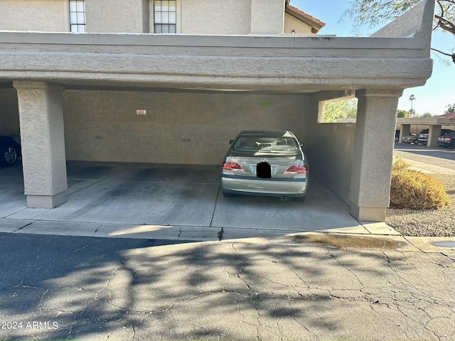 view of car parking featuring a carport