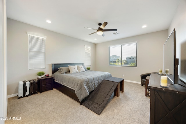 bedroom with light carpet, baseboards, visible vents, and recessed lighting