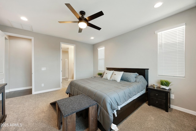 bedroom featuring light colored carpet, baseboards, and recessed lighting