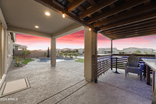 view of patio / terrace with a fenced backyard, a residential view, and a fenced in pool